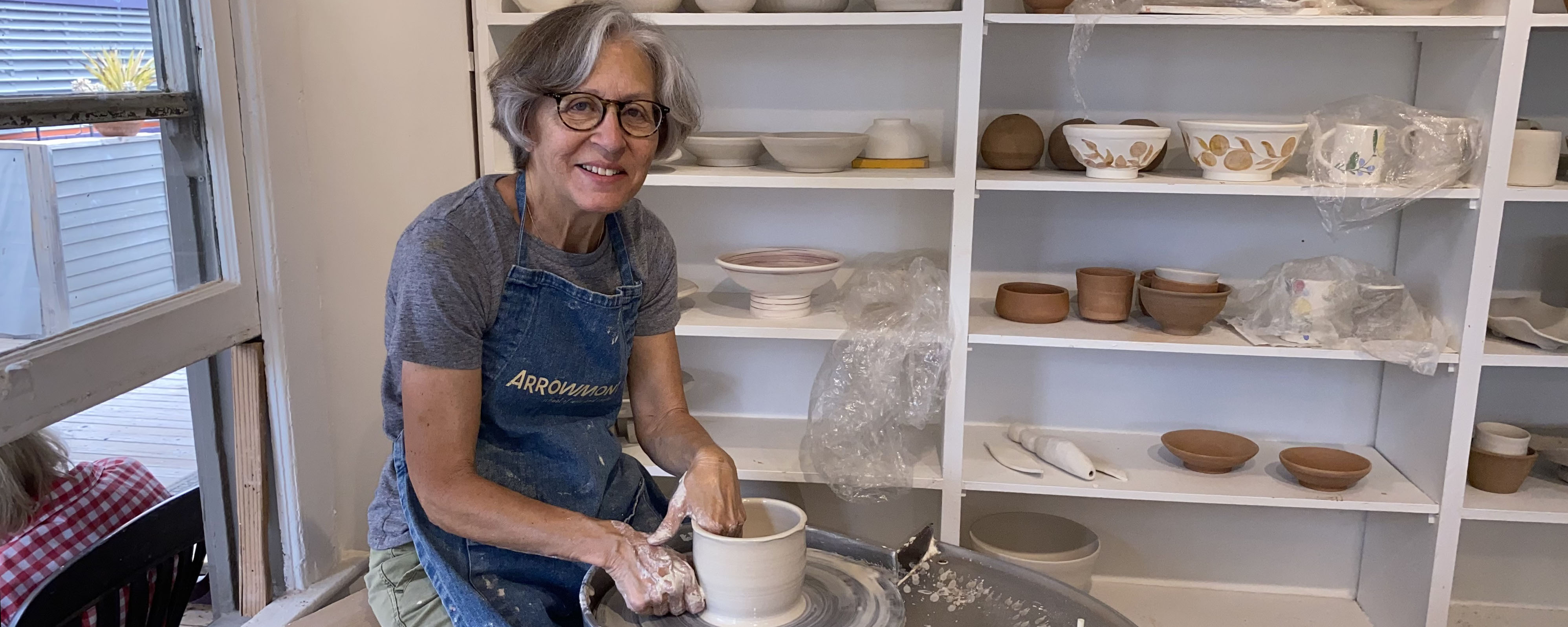 Merle Lambeth unloading a kiln.